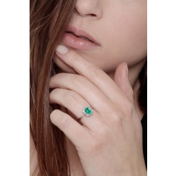 ANELLO CONTORNO CON 10BRILLANTI E SMERALDO OVALE MM6X5 2