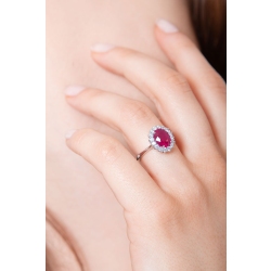 ANELLO CONTORNO CON 16BRILLANTI E RUBINO OVALE 9X7 2