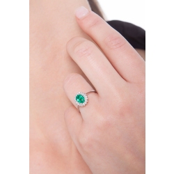 White gold 18k halo ring with diamonds and emerald oval cut  2