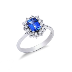 White gold 18k halo ring with diamonds and central blue sapphire 
