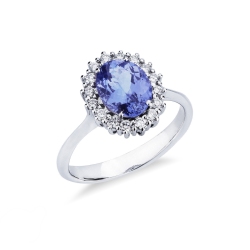 Anello contorno con tanzanite ovale e diamanti in oro bianco 18k 