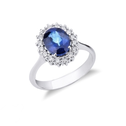 White gold 18k ring with a blue sapphire and diamonds