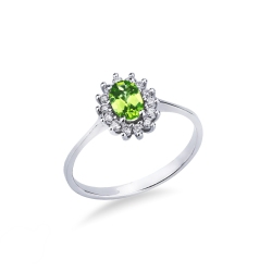 Halo ring in 18k white gold with oval cut peridot and diamonds