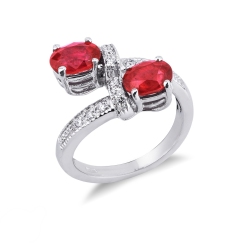 White gold 18k curved shank ring with diamonds an rubies oval cut 