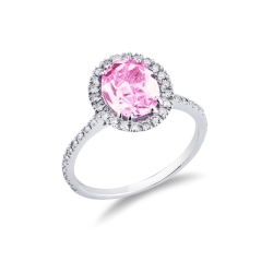 18k white gold halo ring with oval cut pink sapphire and diamond shoulder set