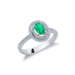 White gold 18k halo ring with emerald oval cut and diamonds 