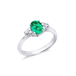 18k white gold with a central emerald oval cut and diamonds 