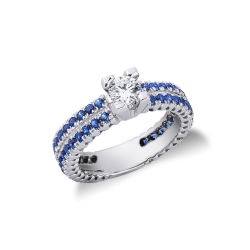 18k white gold ring with central diamond and blue sapphires 