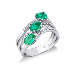 18k white gold wavy ring with diamonds and emeralds 