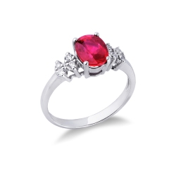 Anillo de oro blanco de 18 quilates con rubí ovalado y diamantes