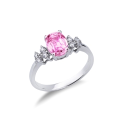 White gold 18k ring with pink sapphire and four lateral diamonds 