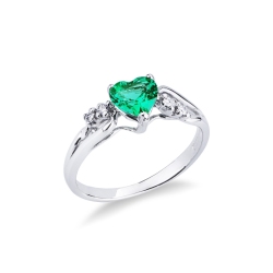 White gold 18k ring with diamonds and a heart cut emerald