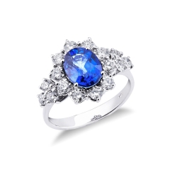 Halo ring with a blue sapphire and diamonds white gold 18k 