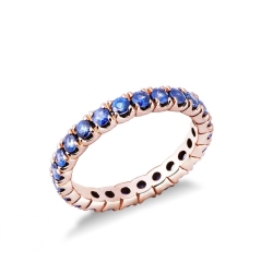 Anillo Eternity en oro rosa 18k con zafiros azules