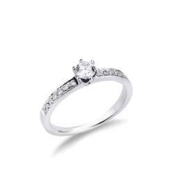 6 claw solitaire ring with a 0,30 ct diamond and diamonds shoulder set 