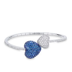 Bracelet in white gold 750 with two hearts in diamonds and blue sapphires