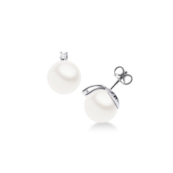 White gold 18k stud earrings with pearls of about 11.50 mm and diamonds 