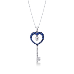 Key pendant with diamonds and blue sapphires