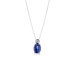 Blue sapphire pendant with round cut diamond