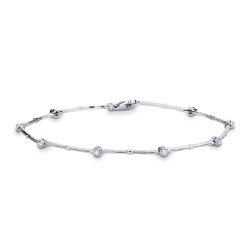 Pulsera tenis alternada oro blanco de 18 quilates con diamantes