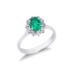 ANELLO CONTORNO CON 10BRILLANTI E SMERALDO OVALE MM6X5