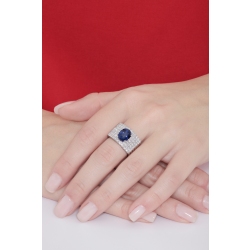 Band ring with a central blue sapphire oval cut and diamonds 2