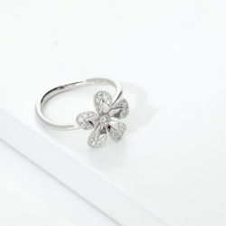 18k white gold floral ring with diamond set petals