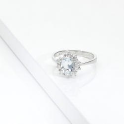 ANELLO CONTORNO CON 10BRILLANTI E ACQUAM. OVALE MM7X5 CIRCA