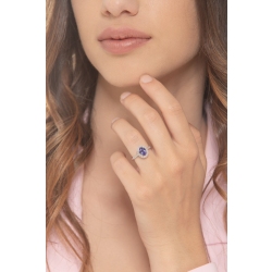 White gold 18k ring with an oval cut tanzanite and diamonds halo 2