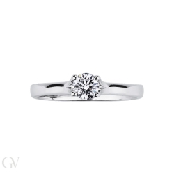 Four prong classic solitaire setting white gold